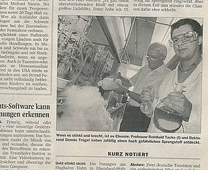Zeitungsausschnitt mit Foto von Würzburger Chemikern