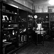 Room with shelves full of old apparatus from psychology