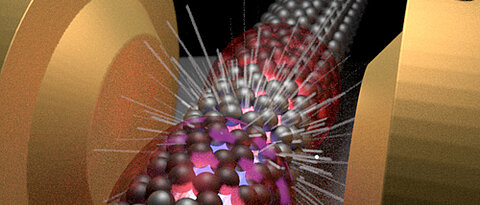 Elektronen im Triplett-Zustand sichtbar gemacht: Ihr Zusammenstoß in einer Nanoröhre führt zu einer Lichtemission, die der Schlüssel für die Untersuchung dieser sonst quasi unsichtbaren Zustände ist. Die Experimente finden in einem Magnetfeld statt;
