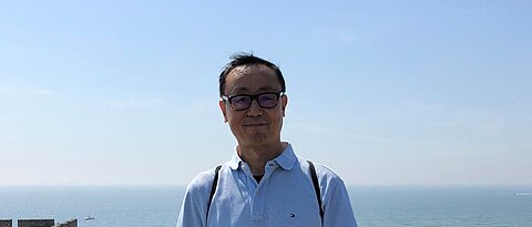 Prof. Can-Ming Hu an der Chinesischen Mauer, Foto: Privat