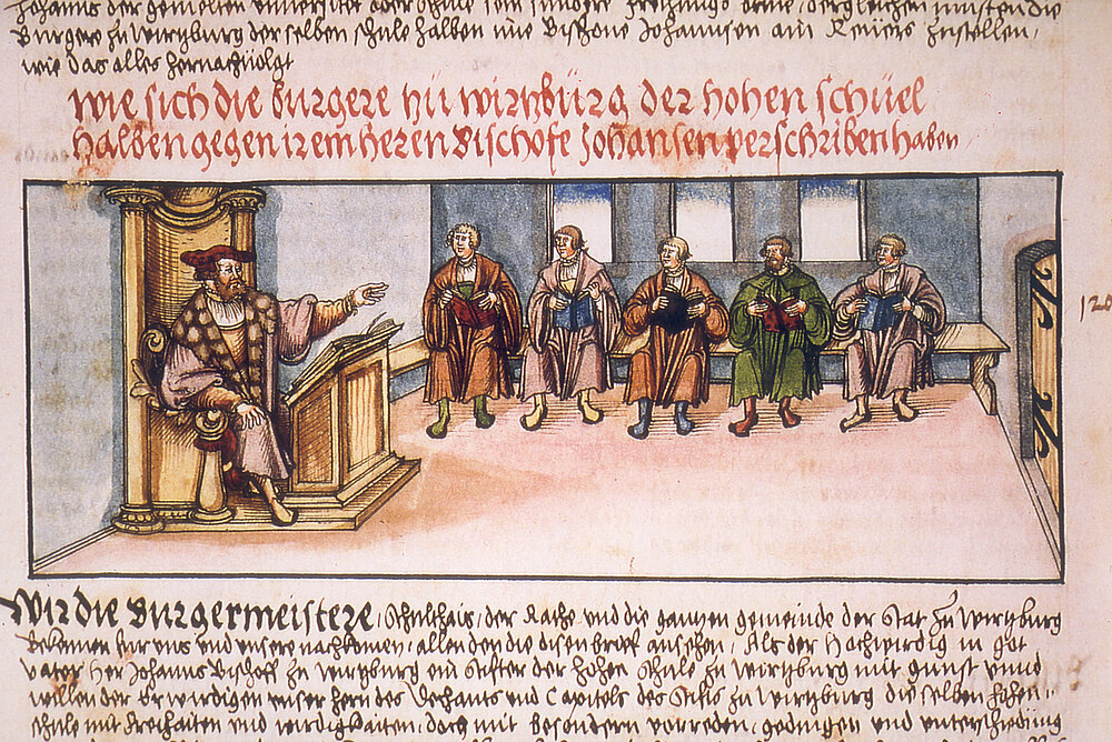 Lehrbetrieb an der jungen Würzburger Universität (ab 1402), dargestellt in der Bischofschronik von Lorenz Fries. Links ein Professor auf seinem Lehrstuhl; auf einer Bank entlang der Wand fünf Studenten mit ihren Büchern.