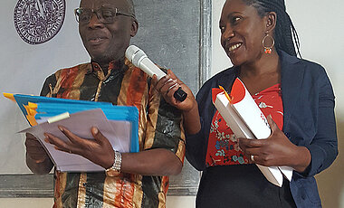 Verkünden die BEBUC-Preisträger 2019 in Goma: Virima Mudogo (links) und Karine Ndjoko.