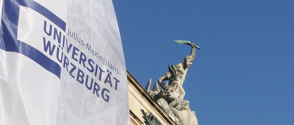 Flag of the University, Prometheus Statue